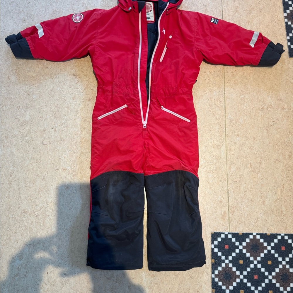 Unisex Helly Hansen one piece ski suit.